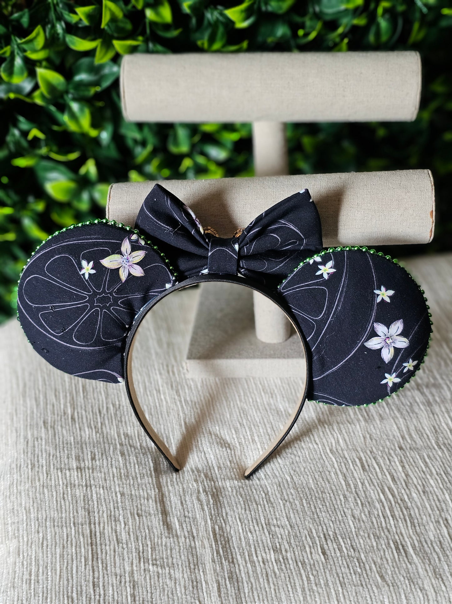 Orange blossom ear headband with charm